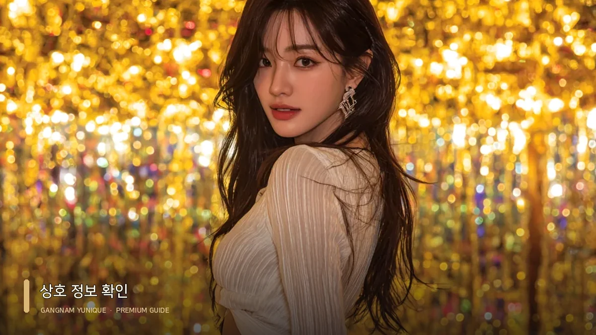 베이지 재킷을 입은 여성 모델의 측면 포즈